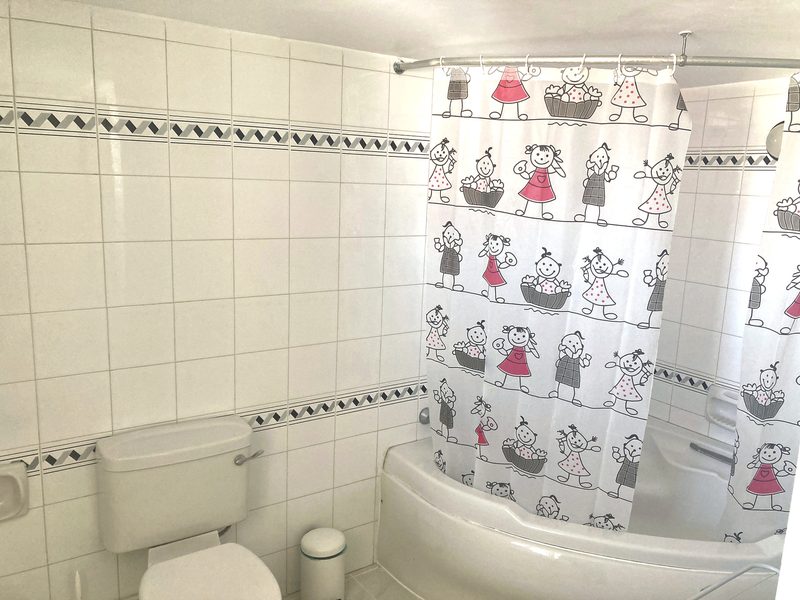 Second bathroom fitted with a full-size bath and WC